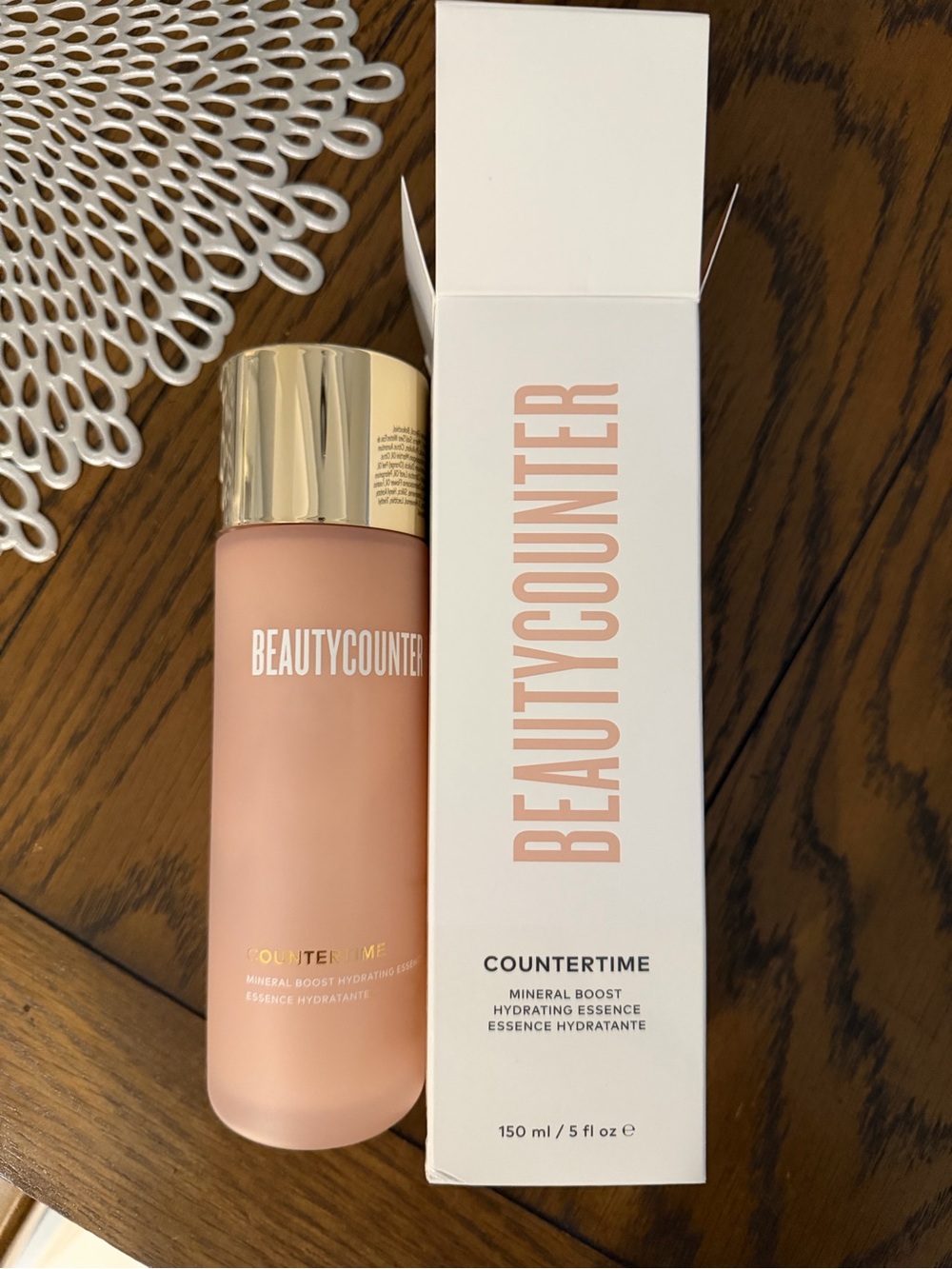 beautycounter hydrating essence primer in soft pink with gold cap